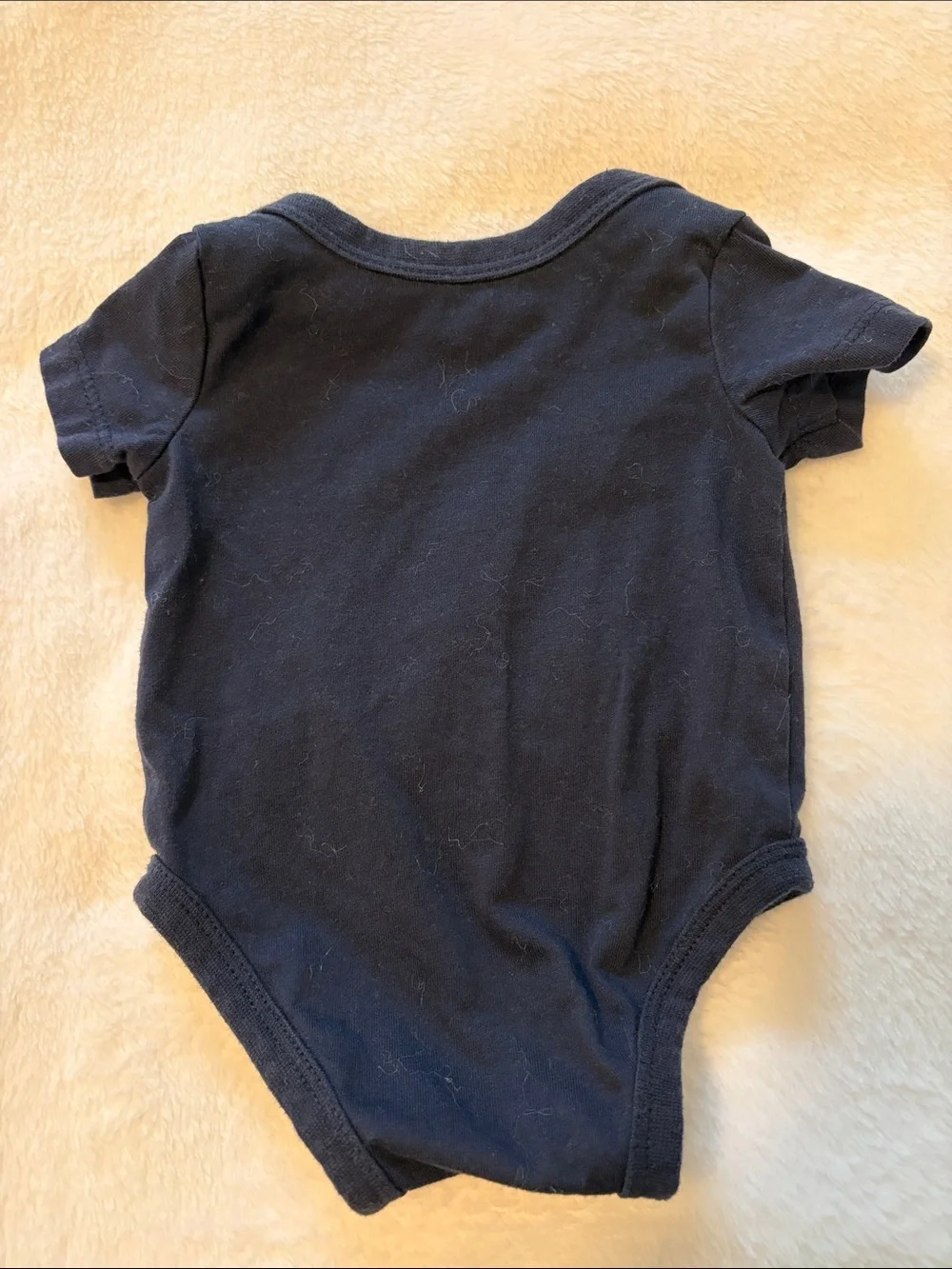 Nike newborn Navy One-Piece Bodysuit with White Swoosh